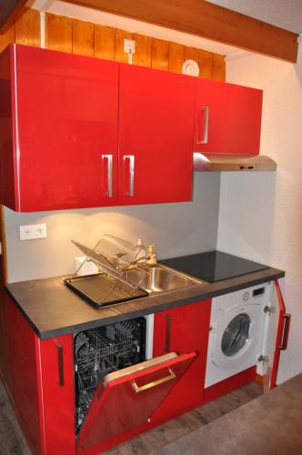 cuisine, plaque induction, lave vaisselle, lave linge séchant